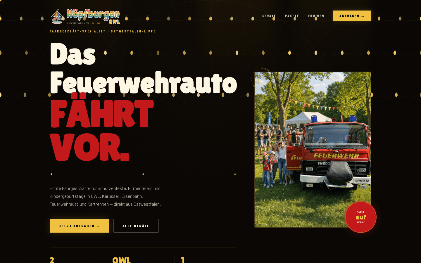 Startseite von huepfburg-owl.de: „Das Feuerwehrauto fährt vor.“ mit Foto des Feuerwehrauto-Fahrgeschäfts